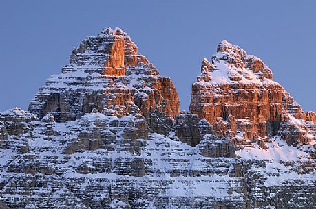 After a heavy snowfall on a cold winter morning, sunrise from Misurina towards the Tre Cime di Lavaredo peak, dolomites, Veneto, Italy, Europe