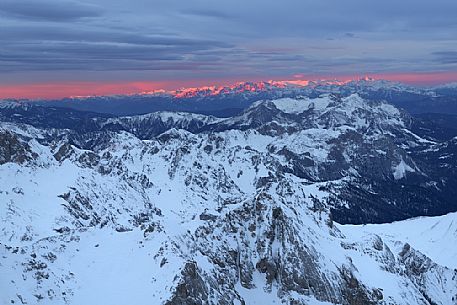 Winter panorama at dawn from Punta Rocca (3265 m), one of the peaks of the Marmolada and in the background the Lagorai mountain group, dolomites, Veneto, Italy, Europe