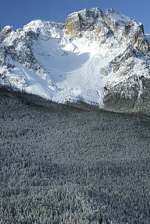 Comelico valley in a winter day, in the background the Croda da Campo peak in the Sesto dolomites, Veneto, Italy, Europe