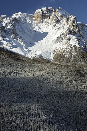 Comelico valley in a winter day, in the background the Croda da Campo peak in the Sesto dolomites, Veneto, Italy, Europe