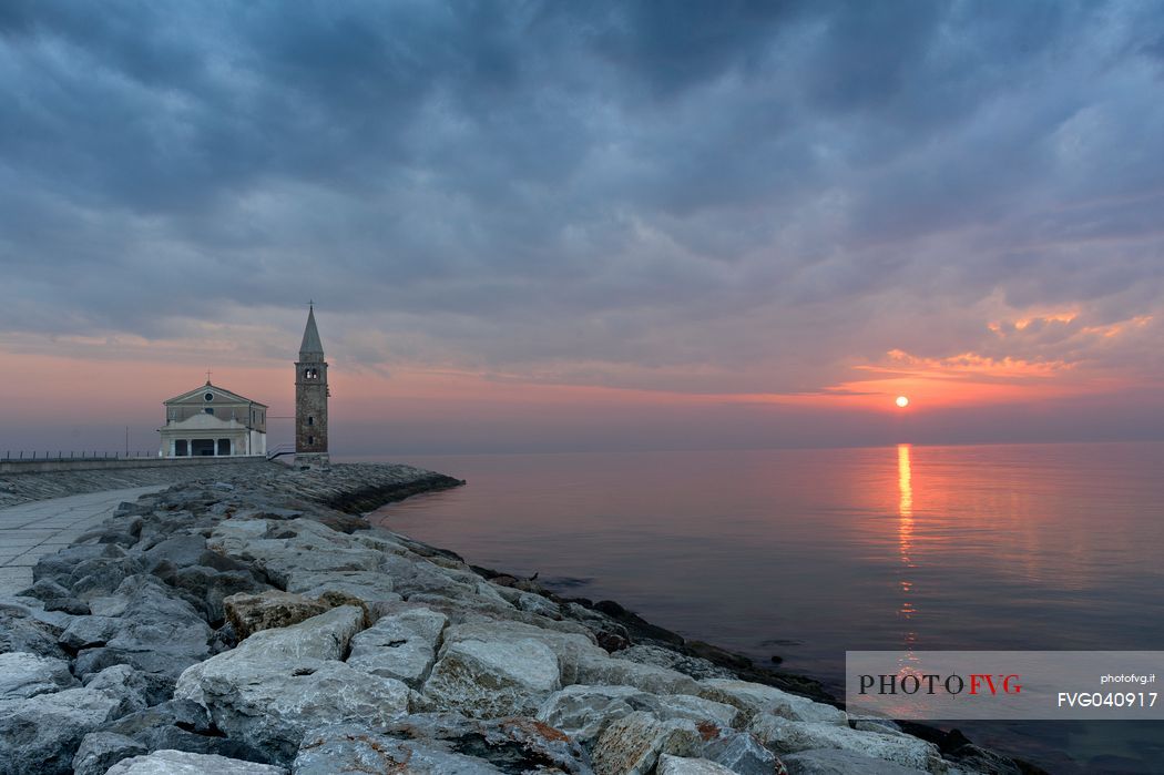 Seascape of Caorle, in the background the Santuario della Madonna dell'Angelo in background, venetian lagoon, Veneto, Italy, Europe
