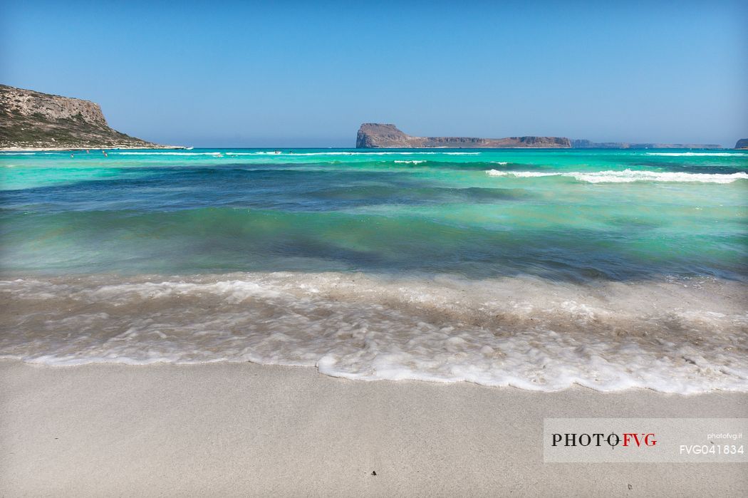 The fantastic colors of the Balos lagoon and in the background the Imeri Gramvousa island in the north of Crete island, Greece