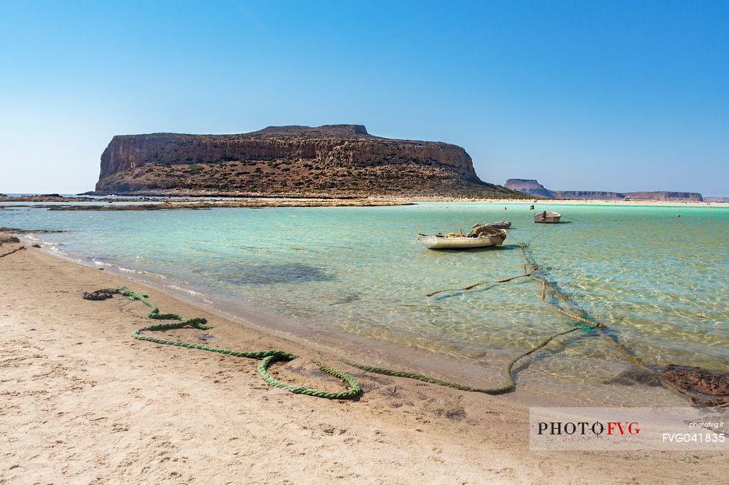 The warm and calm sea of the Balos bay with Capo Tigani in the north of Crete Island, Greece