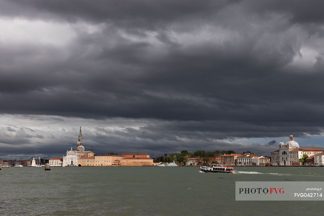 View of the Basilica of San Giorgio Maggiore from Punta della Dogana after the storm, Venice, Veneto, Italy, Europe