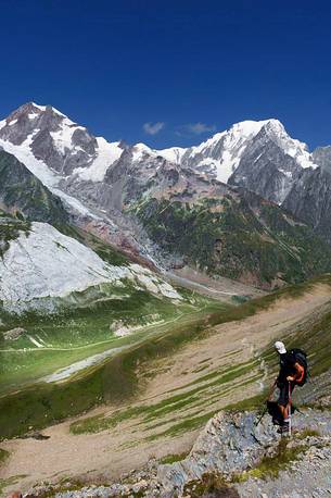 A look at the Aguilles de Tr-la-Tete a few steps from the Col des Chavannes, in the background the Mont Blanc, Courmayeur, Aosta valley, Italy, Europe