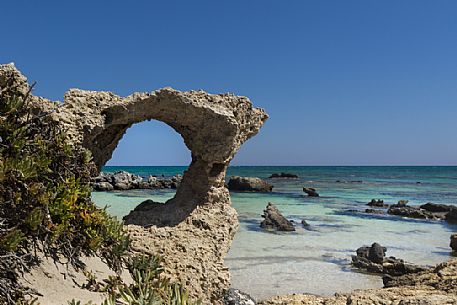 Rocky arch in Elafonissi lagoon the south west Crete island, Greece