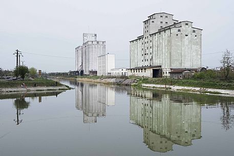 Abandoned and awaiting conversion of grain silos along the Bega channel, Timisoara, Romania, Europe