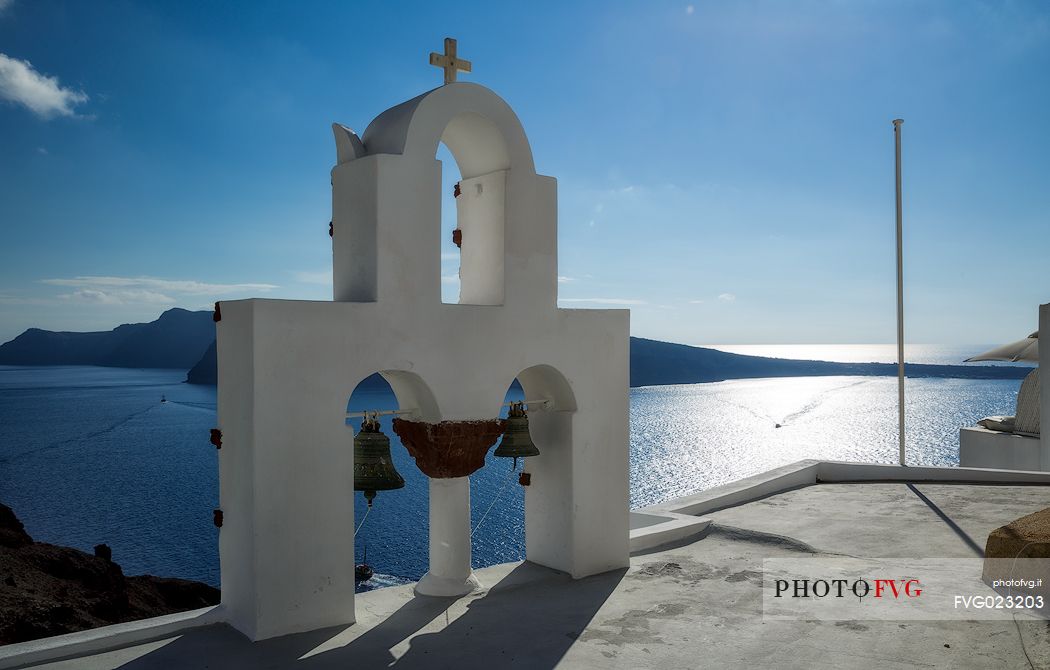 Belfry and Caldera view, Oia village, Santorini island, Greece