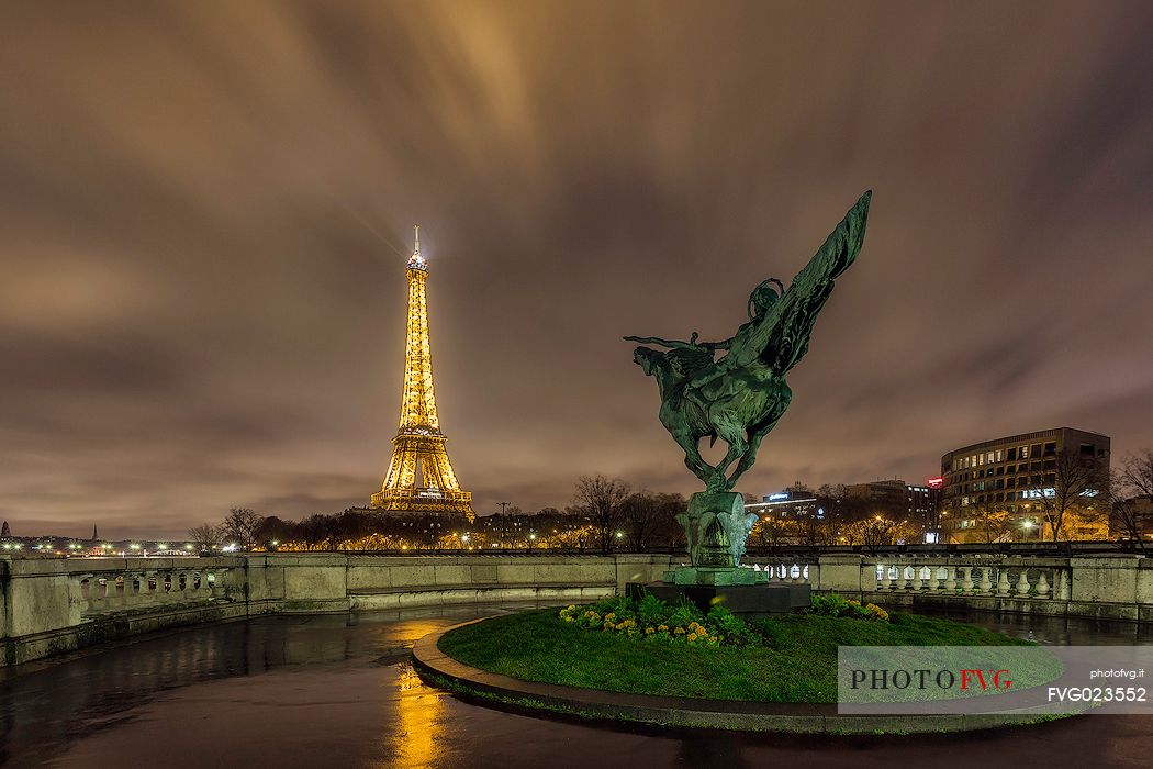 Tour Eiffel and Jeanne D'arc statue, Paris, France
