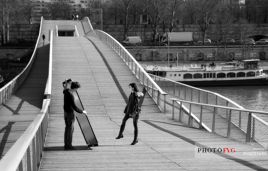 Fashion on Passerelle Simone de Beauvoir, Paris, France