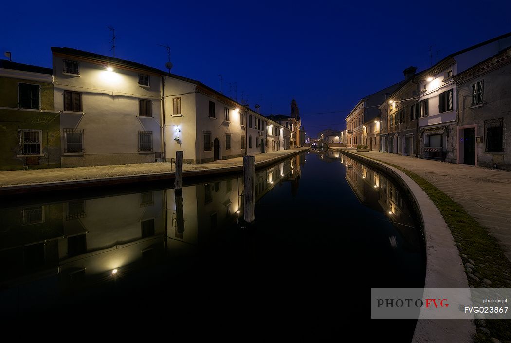 Houses along the canals at twilight, Comacchio, Italy