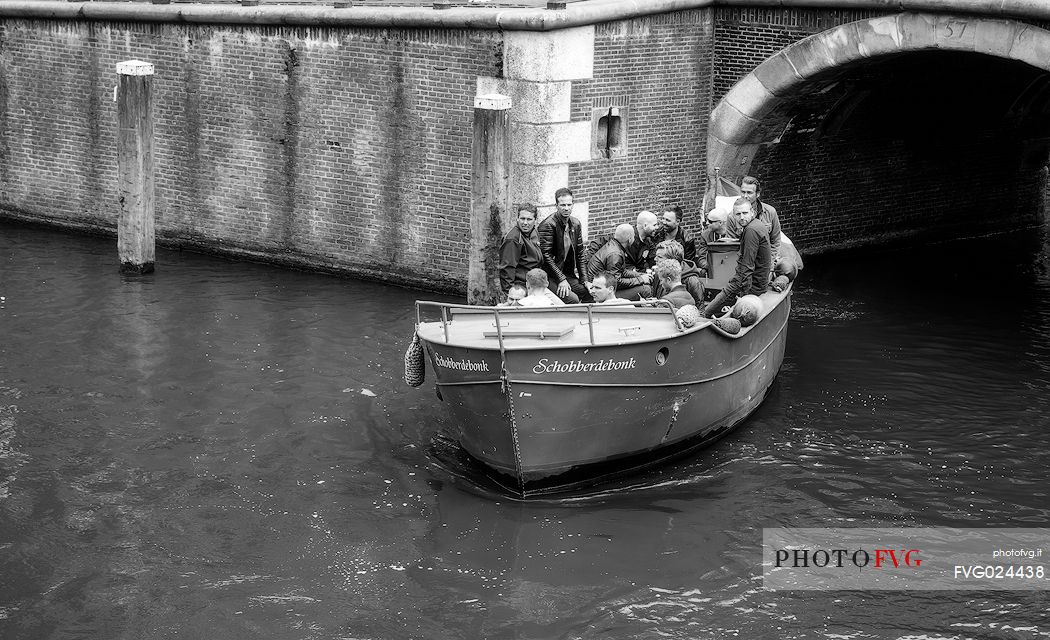 It's saturday and the dutch youth make a party along the Amsterdam canals.Just for fun.Dutch lifestyle. Holland