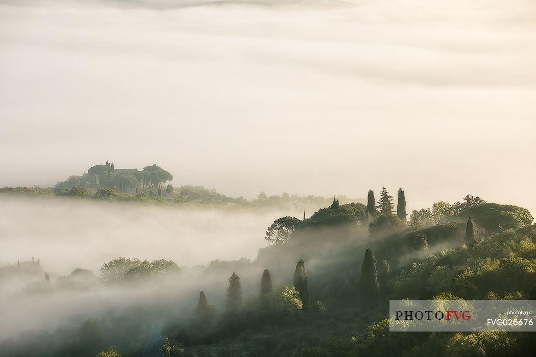 Misty landscape of Orcia Valley, Tuscany, Italy