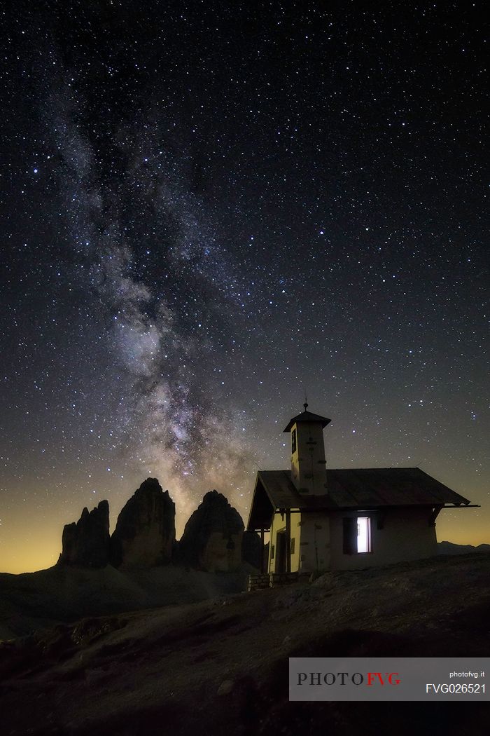 Milky way over the Tre Cime di Lavaredo peaks, dolomites, Italy