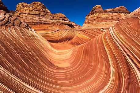 The Wave is a sandstone rock formation located in Arizona close to the Utah border, Paria Canyon-Vermilion Cliffs Wilderness, United States The Wave is a sandstone rock formation located in Arizona close to the Utah border, Paria Canyon-Vermilion Cliffs Wilderness, United States