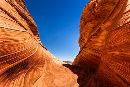 The Wave is a sandstone rock formation located in Arizona close to the Utah border, Paria Canyon-Vermilion Cliffs Wilderness, United States The Wave is a sandstone rock formation located in Arizona close to the Utah border, Paria Canyon-Vermilion Cliffs Wilderness, United States