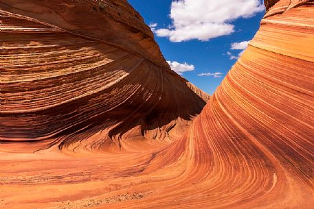 The Wave is a sandstone rock formation located in Arizona close to the Utah border, Paria Canyon-Vermilion Cliffs Wilderness, United States The Wave is a sandstone rock formation located in Arizona close to the Utah border, Paria Canyon-Vermilion Cliffs Wilderness, United States