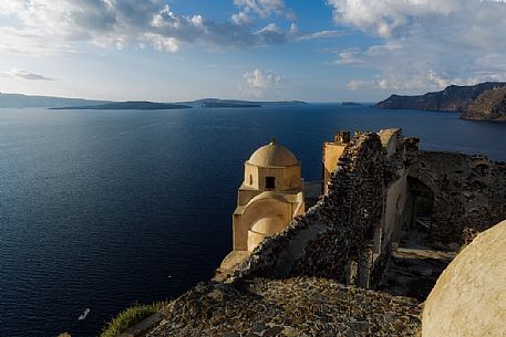 Caldera view from old ruins church of Oia village, Santorini island, Greece
