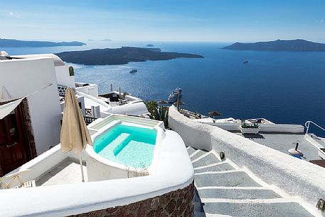 A pool in an exclusive resort in Firostefani village, Santorini island, Greece
A pool in an exclusive resort in Firostefani village, Santorini island, Greece