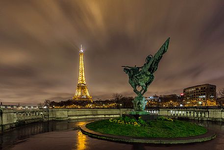 Tour Eiffel and Jeanne D'arc statue, Paris, France
