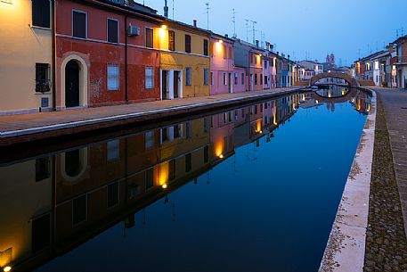 Houses along the canals at twilight, Comacchio, Italy