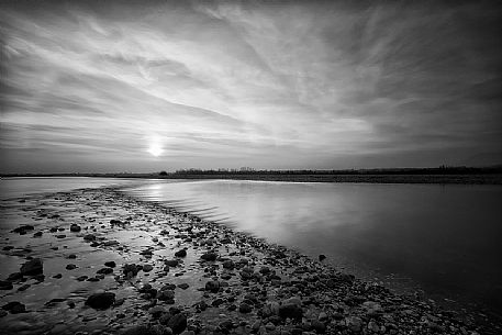 Sunset on Talgliamento river, Italy