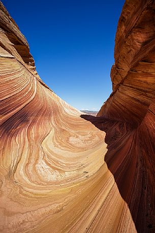 The Wave is a sandstone rock formation located in Arizona close to the Utah border, Paria Canyon-Vermilion Cliffs Wilderness, United States The Wave is a sandstone rock formation located in Arizona close to the Utah border, Paria Canyon-Vermilion Cliffs Wilderness, United States