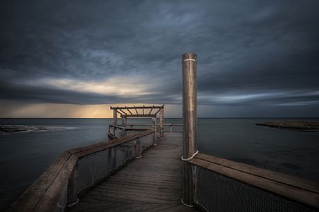 Pier on lungolaguna Trento in Lignano Sabbiadoro, Adriatic sea, Friuli Venezia Giulia, Italy
Pier on lungolaguna Trento in Lignano Sabbiadoro, Adriatic sea, Friuli Venezia Giulia, Italy