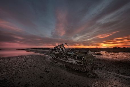 Wreck boat on river Tagliamento mouth, adriatic sea, Friuli Venezia Giulia, Italy