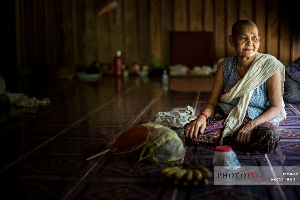 Old woman in a temple