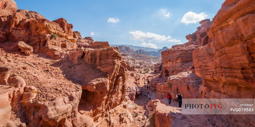 Tourists visit the old village of Petra, Jordan