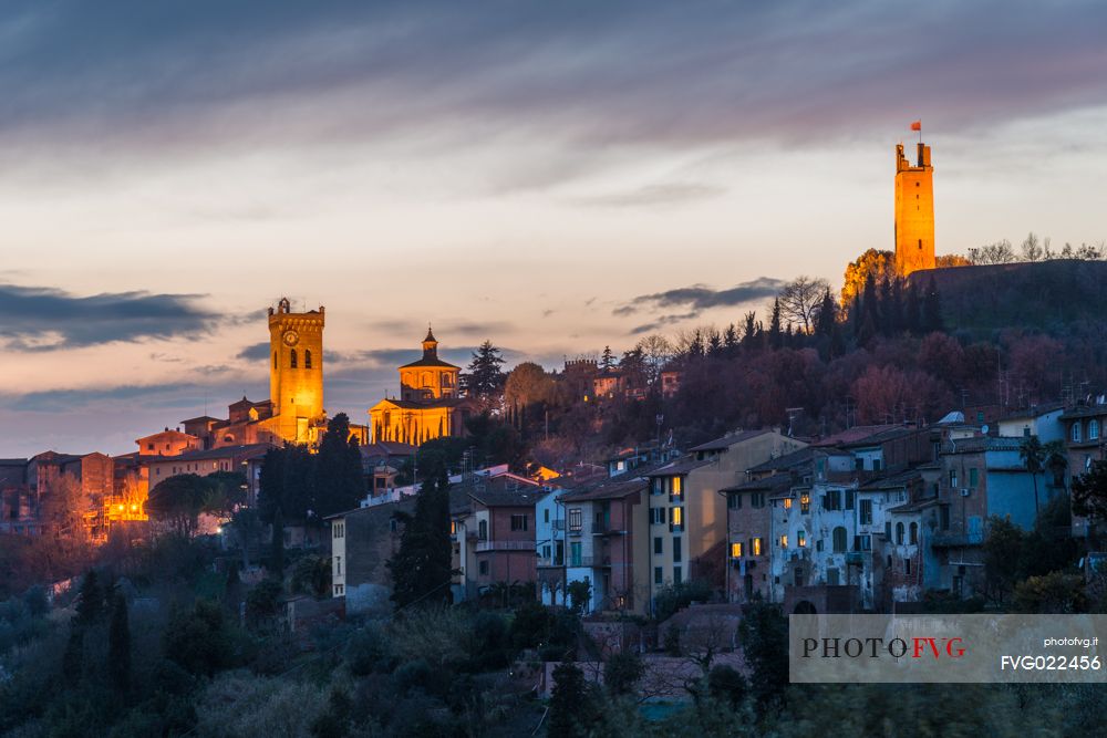 Twilight on the hills of San Miniato with Matilde and Federico II towers illuminated, Tuscany, Italy