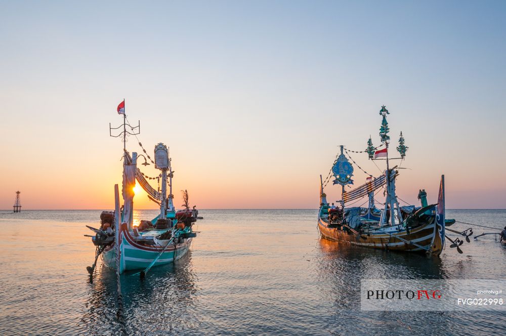 Traditional boats in a beautiful sunset in Lovina Beach, Bali island, Indonesia