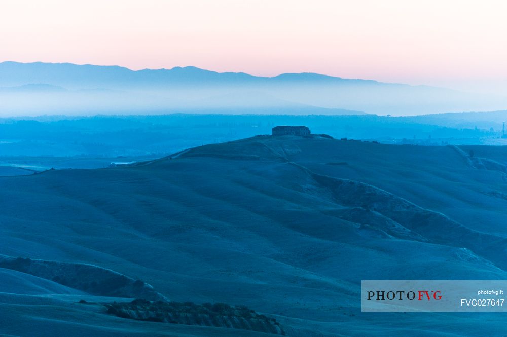 Crete Senesi landscapes at the twilight, Orcia valley, Tuscany, Italy