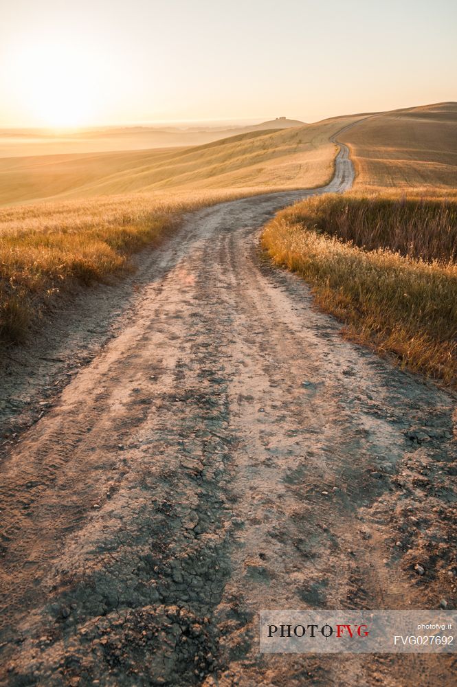 Sunrise in the Crete Senesi landscape, Orcia valley, Tuscany, Italy