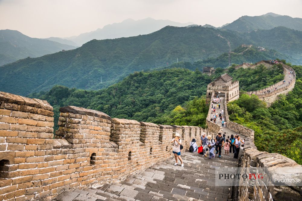 Tourists at the great wall in the  Mutianyu village section, Beijing, China