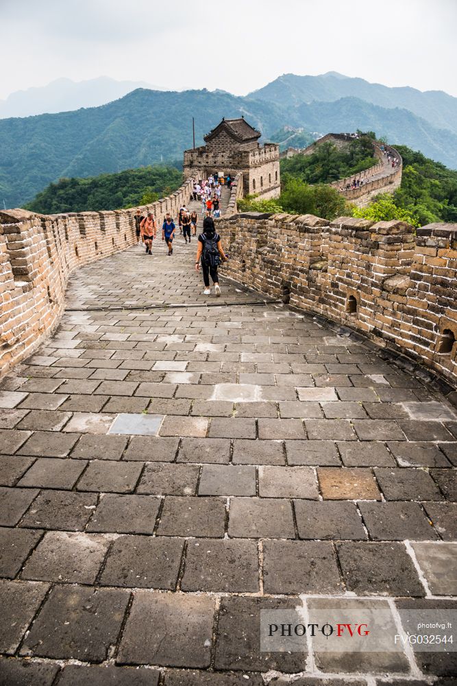 Tourists at the great wall in the  Mutianyu village section, Beijing, China