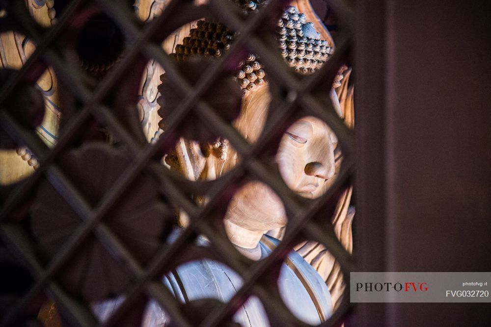 Buddha statue inside ancient hanging temple near Datong, Heng Shan mount, Shanxi, China