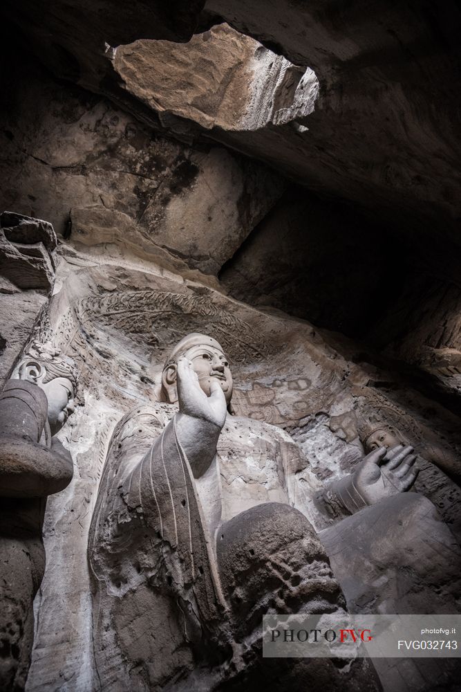 The beautiful ancient remains of Buddha Statue in Yungang Grottoes, Datong, Shanxi Province, China