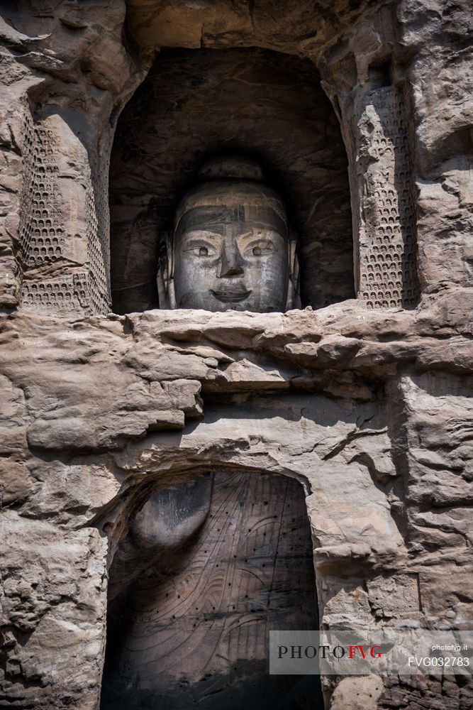 The beautiful ancient remains of Buddha Statue in Yungang Grottoes, Datong, Shanxi Province, China