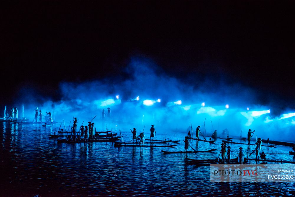 Evening showtime, the stunning scenery of the Li River sets the stage for the Liu San Jie or Sanjie Liu Impression Light Show, Yangshuo, Guangxi, China