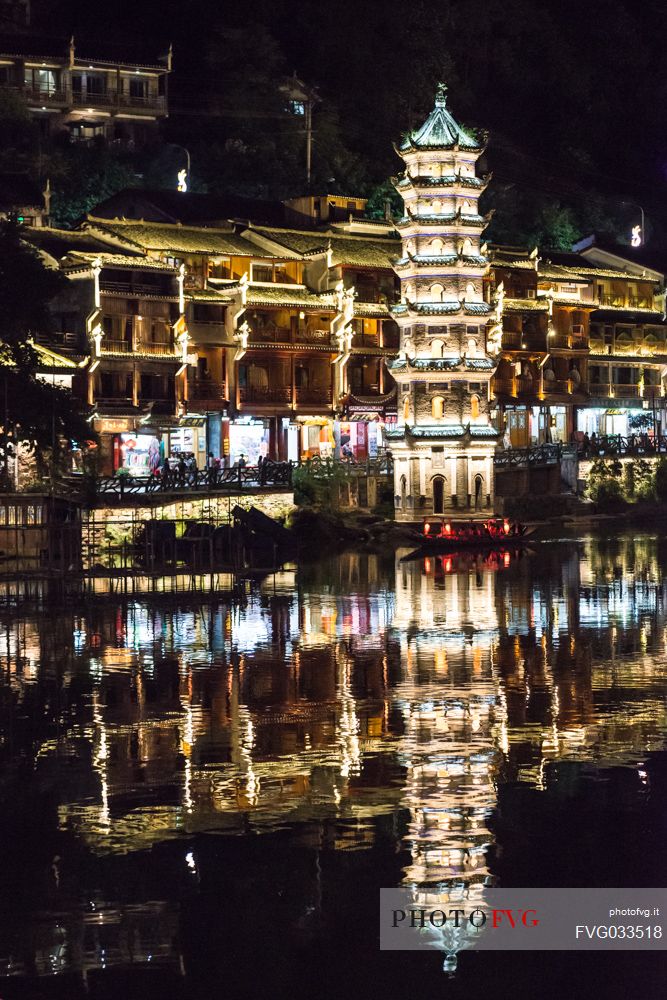 Night view of ancient town of Fenghuang or Phoenix with Wanming pagoda, Hunan, China