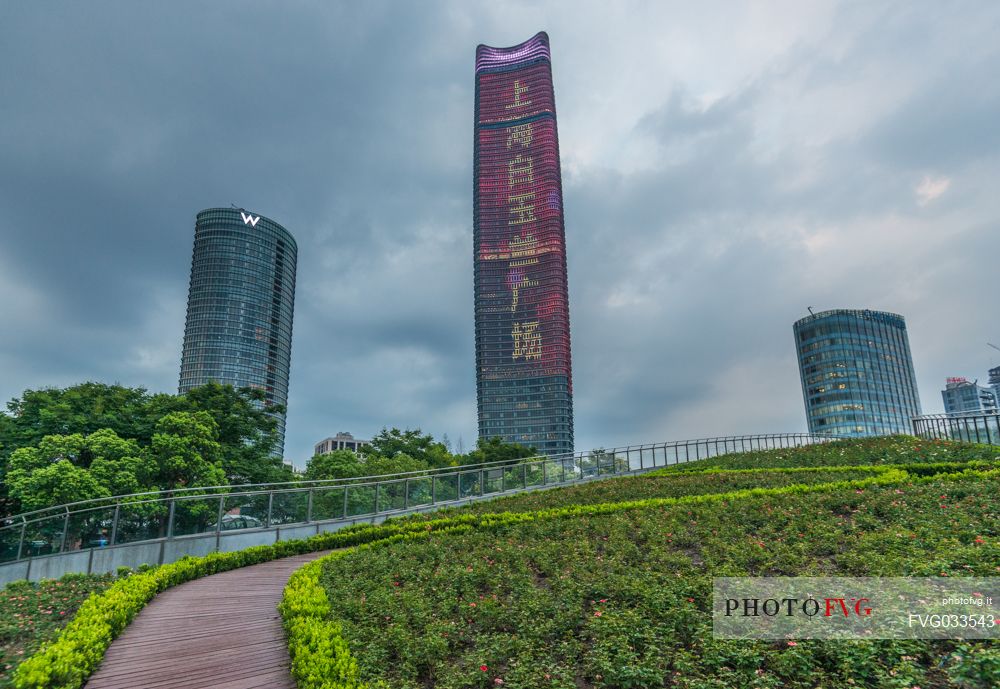 Shanghai commercial district modern urban architecture and green city park, China