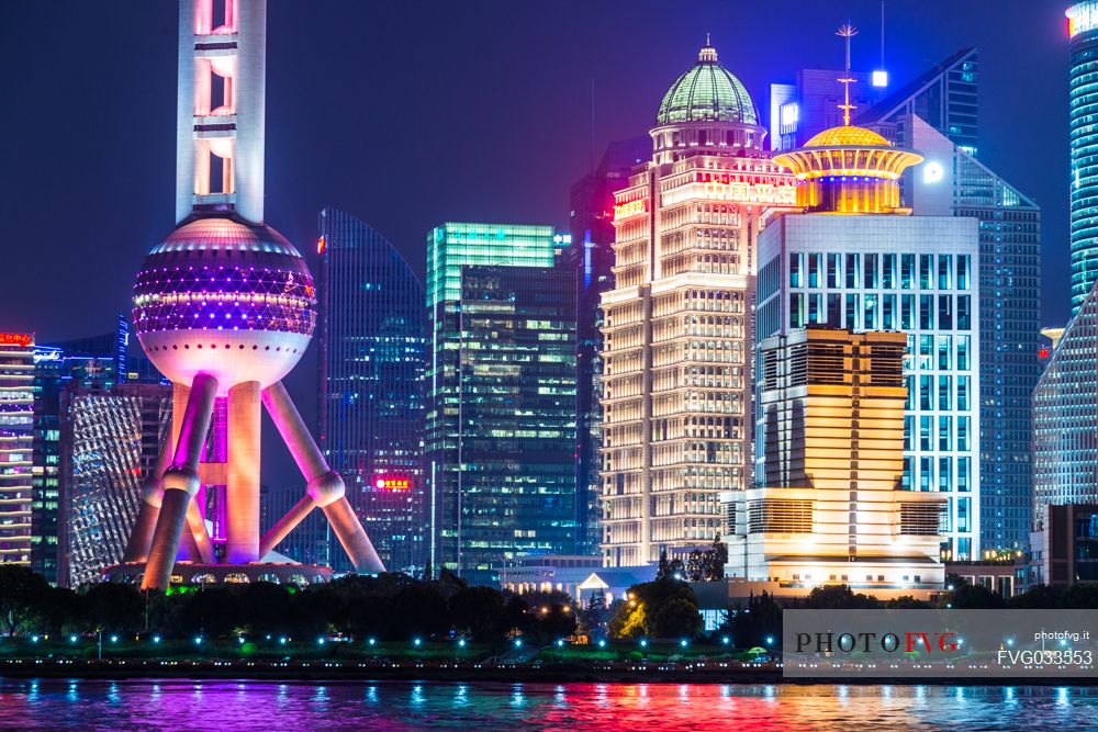 Lujiazui Financial District skyline with Oriental Pearl Tower by night in Shanghai city, China