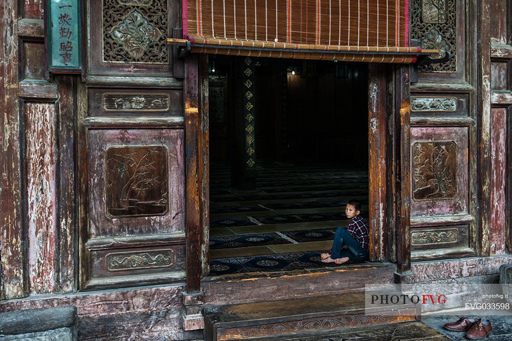 Child in Jewish quarter in Xi'An village, Shanxi, China