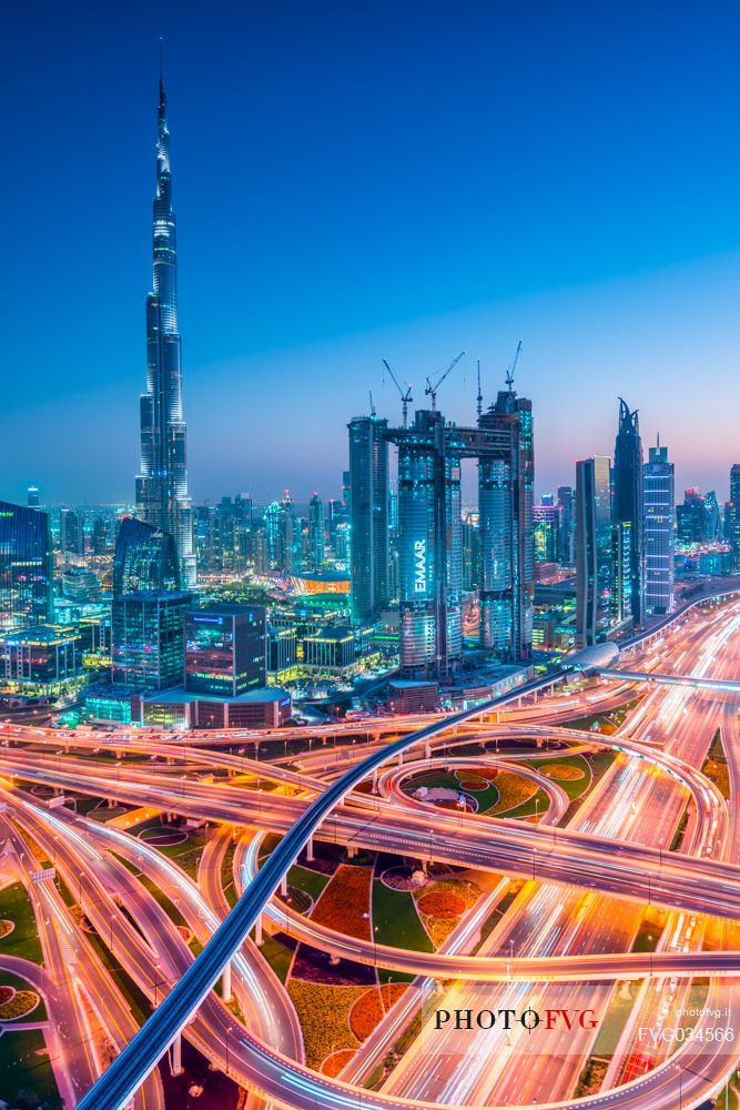 Burj Khalifa and High Rises on Sheikh Zayed Road at twilight, Downtown Dubai, Emirate of Dubai, UAE, Asia