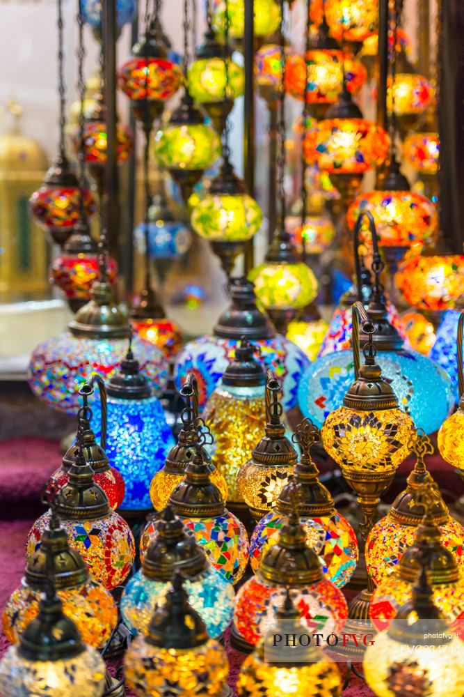 Traditional multicolored eastern glass lamps lighting on Dubai souk, United Arab Emirates, Asia