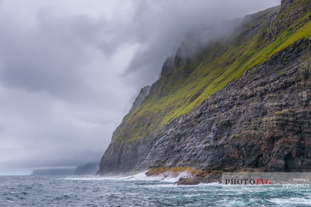 View from the sea of ​​the Vestmanna Sea Cliffs, Streymoy island, Faeroe islands, Denmark, Europe