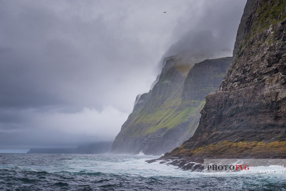 View from the sea of ​​the Vestmanna Sea Cliffs, Streymoy island, Faeroe islands, Denmark, Europe