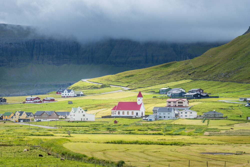 Hvalba village with the small church, Suuroy Island, Faeroe islands, Denmark, Europe